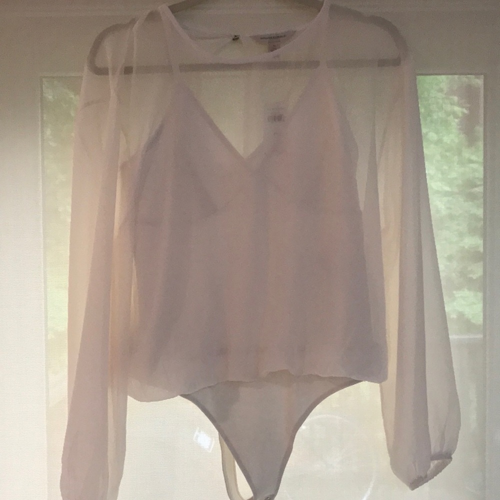 Stunning sheer blouse with attached body suit.